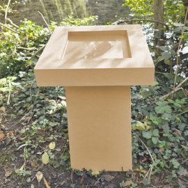 Contemporary Birdbath in garden buff